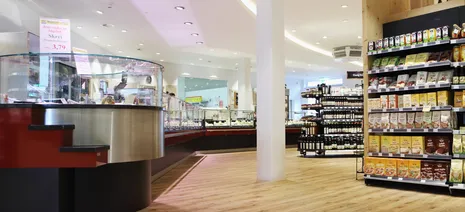 wineo Purline Bioboden Holzoptik Warenpräsentation Regal Bioladen 