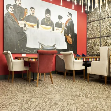 wineo Designboden Mosaik Muster grau Restaurant Kultur 